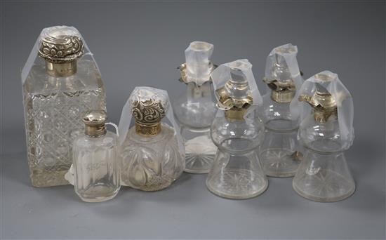 A collection of silver-mounted glass items,